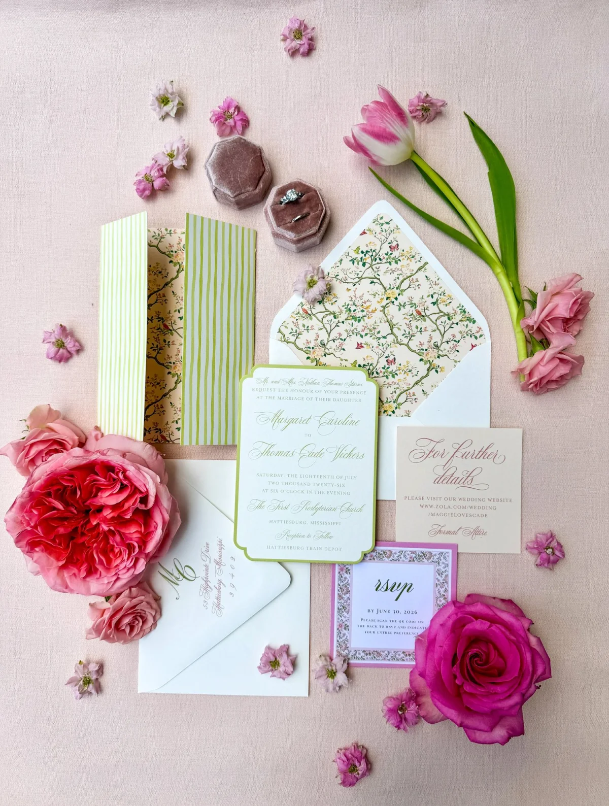 Wedding invitations, rings, and flowers arranged as a quiet record of the day